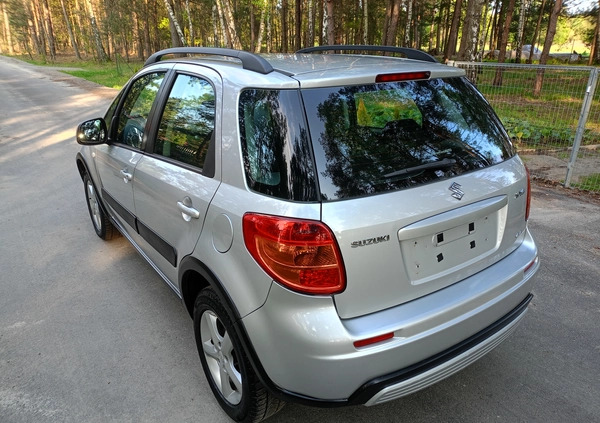 Suzuki SX4 cena 26990 przebieg: 170000, rok produkcji 2009 z Stepnica małe 379